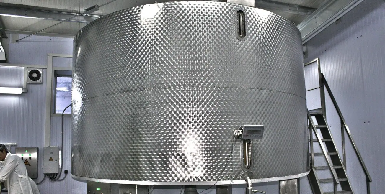The stainless-steel homogenising tank at the processing station.